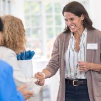 Jen Moore receiving her bag